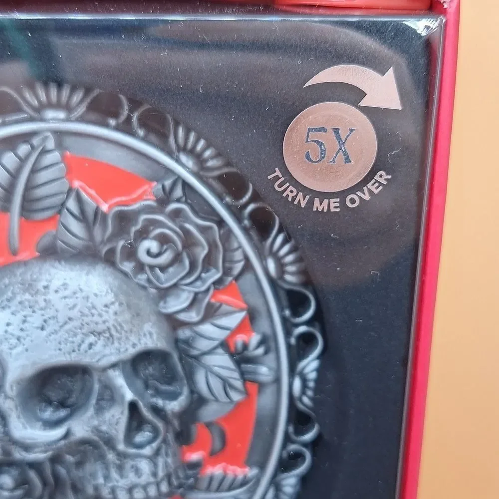 Skull magnifying handheld mirror